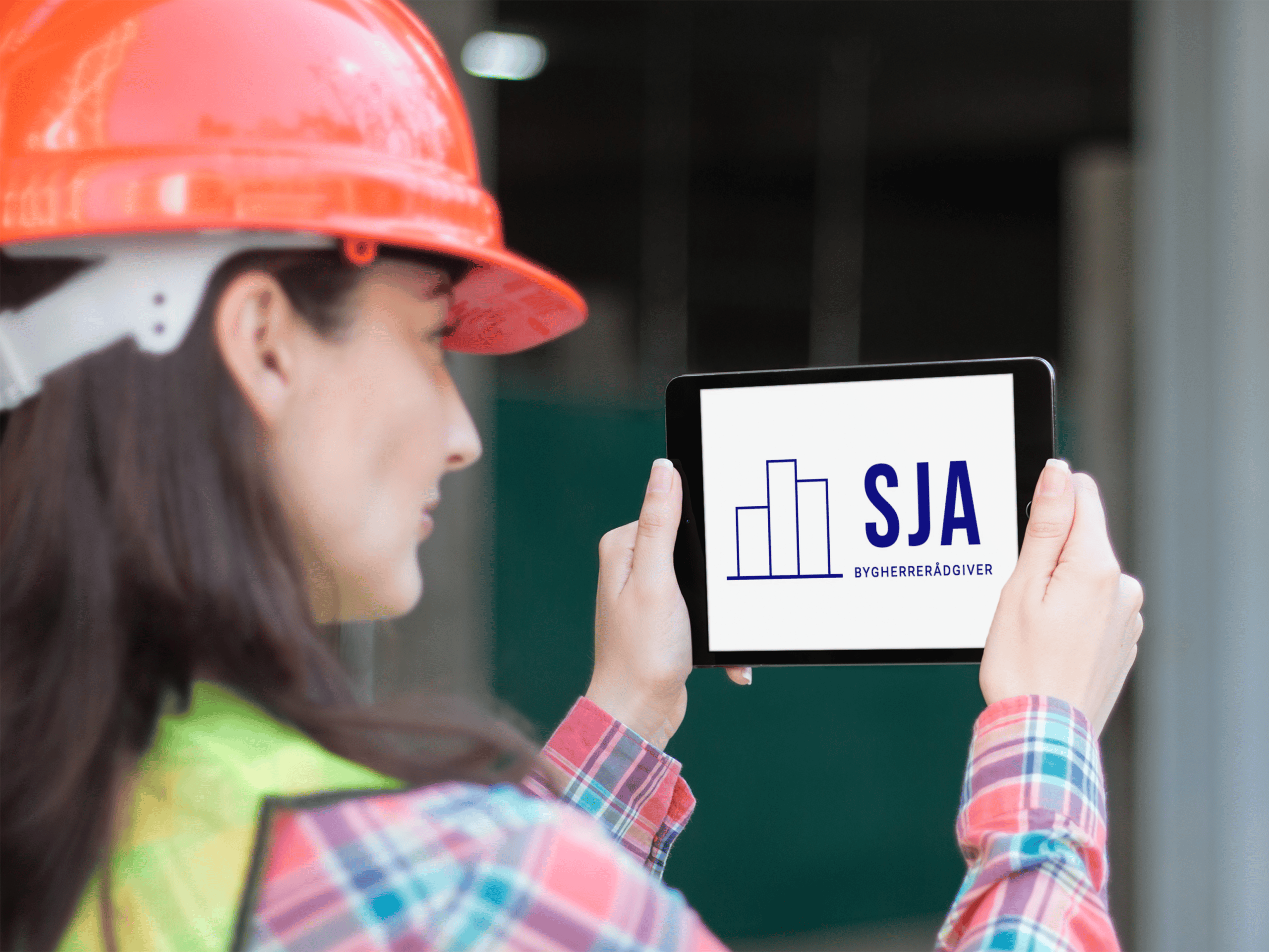 mockup-of-a-female-engineer-looking-at-an-ipad-in-landscape-position-12567b